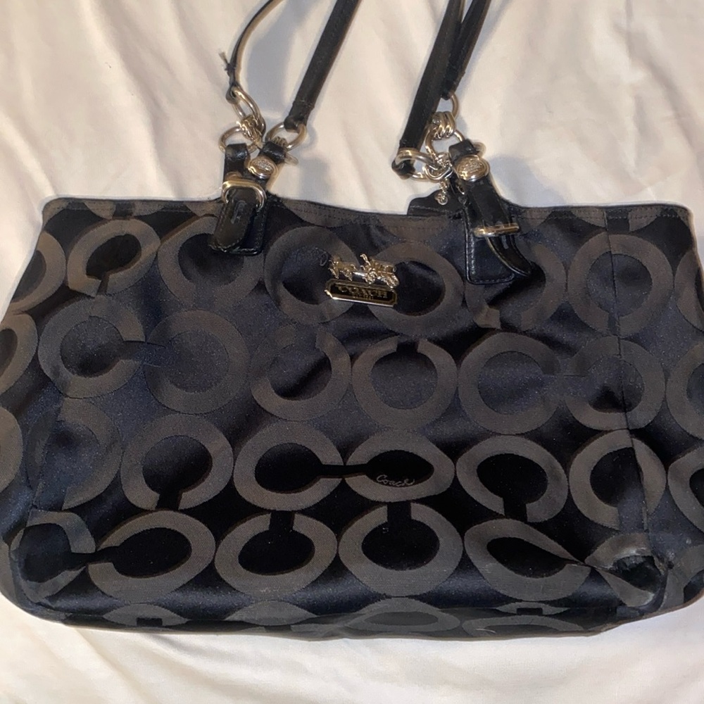 Coach black and purple interior purse.
